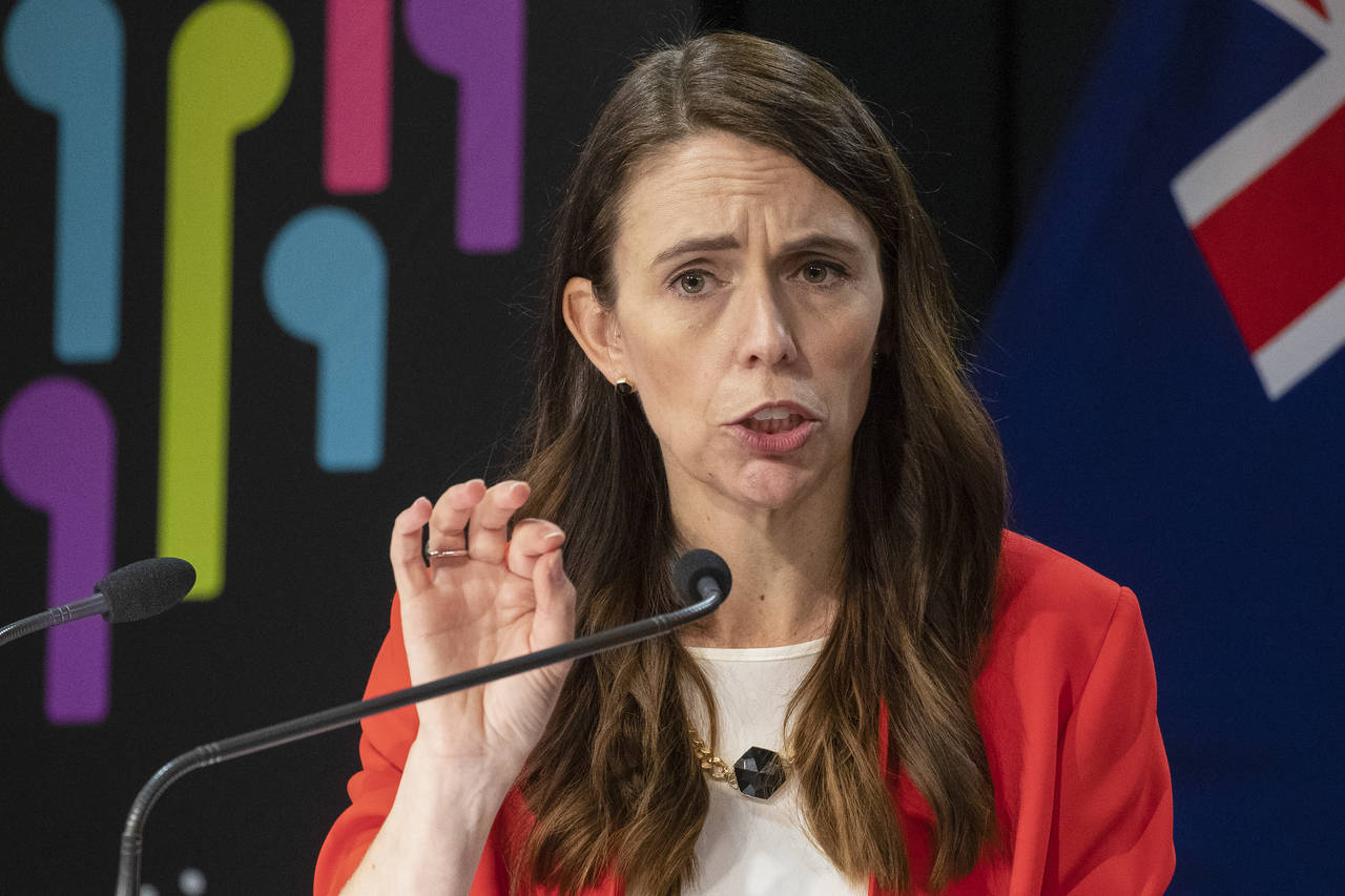 FILE - New Zealand Prime Minister Jacinda Ardern gestures during a press conference at parliament i...