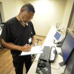 
              Radiology manager Marshall C. Pritchett Jr. works on a file at Thomasville Regional Medical Center in Thomasville, Ala., on Tuesday, May 3, 2022. The hospital is among three in the nation that say they are missing out on federal pandemic relief money because they opened during or shortly before the COVID-19 crisis began. (AP Photo/Jay Reeves)
            