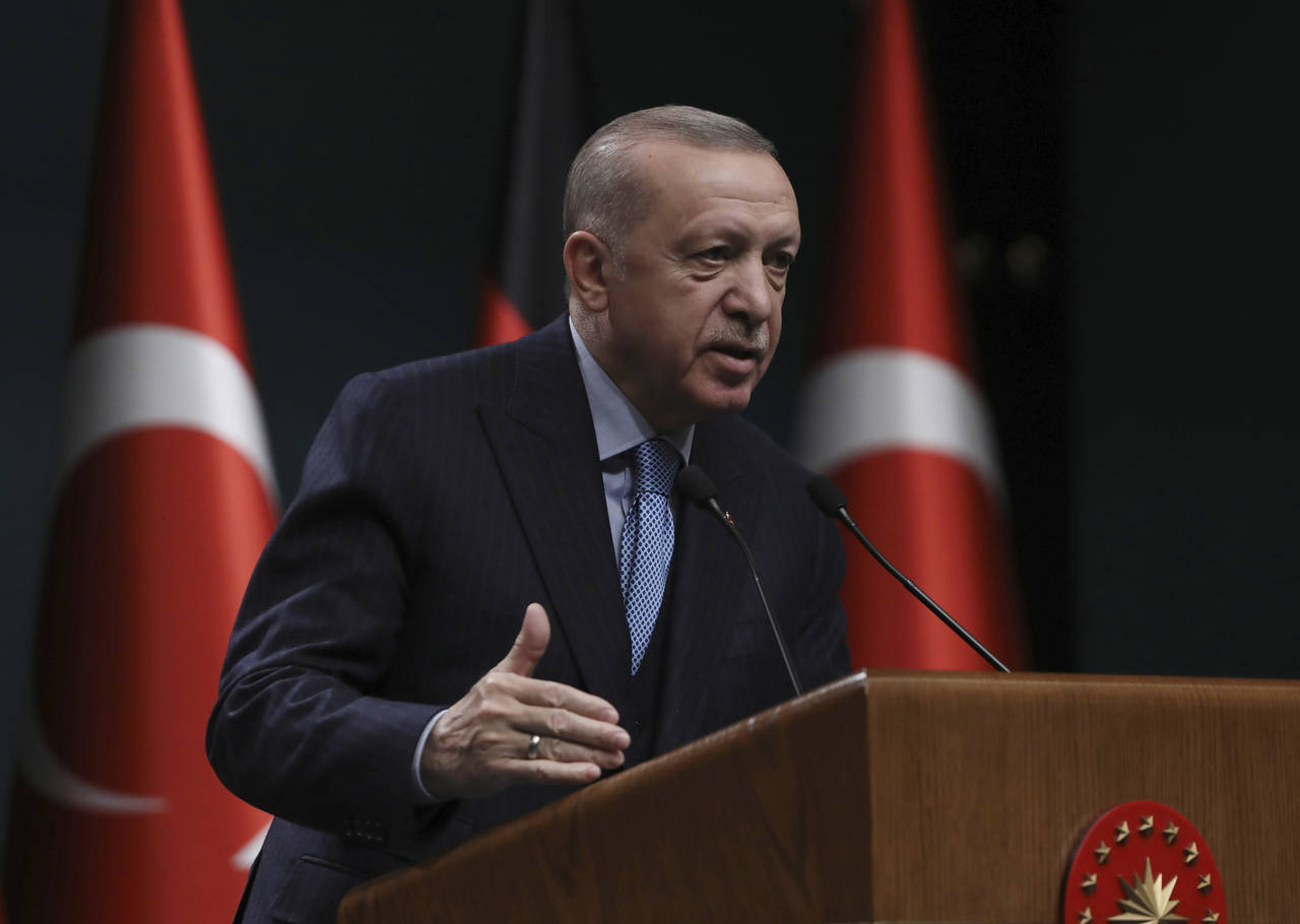 FILE - Turkey's President Recep Tayyip Erdogan speaks during a news conference, in Ankara, Turkey o...