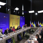 
              European leaders attend the High-Level International Donor's Conference for Ukraine at the National Stadium in Warsaw, Poland, Thursday, May 5, 2022. The conference aims to raise funds for Ukraine's growing humanitarian needs. Poland and Sweden want to encourage their partners to jointly respond to the difficult humanitarian situation in Ukraine. (AP Photo/Michal Dyjuk)
            