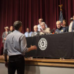 
              Democrat Beto O’Rourke, who is running against Abbott for governor this year, interrupts a news conference headed by Texas Gov. Greg Abbott in Uvalde, Texas Wednesday, May 25, 2022. (AP Photo/Dario Lopez-Mills)
            