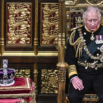 
              Britain's Prince Charles sits by the The Imperial State Crown in the House of Lords Chamber, during the State Opening of Parliament, in the Houses of Parliament, in London, Tuesday, May 10, 2022. Britain’s Conservative government made sweeping promises to cut crime, improve health care and revive the pandemic-scarred economy as it laid the laws it plans in the next year in a tradition-steeped ceremony known as the Queen’s Speech -- but without a key player, Queen Elizabeth II, absent for the first time in six decades. The 96-year-old monarch pulled out of the ceremonial State Opening of Parliament because of what Buckingham Palace calls “episodic mobility issues.” Her son and heir, Prince Charles, stood in, rattling through a short speech laying out 38 bills the government plans to pass. (Ben Stansall/Pool Photo via AP)
            