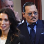 
              Actor Johnny Depp arrives in the courtroom for closing arguments at the Fairfax County Circuit Courthouse in Fairfax, Va., Monday, May 27, 2022. Depp sued his ex-wife Amber Heard for libel in Fairfax County Circuit Court after she wrote an op-ed piece in The Washington Post in 2018 referring to herself as a "public figure representing domestic abuse." (AP Photo/Steve Helber, Pool)
            
