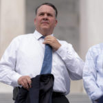 
              FILE - Rep. Alexander Mooney, R-W.Va., left, and Rep. Jim Jordan, R-Ohio, right, appear at a news conference on the steps of the Capitol in Washington, July 29, 2021. A Republican primary in West Virginia's 2nd Congressional District between two incumbents, Rep. David McKinley and Mooney, could hang on support for President Joe Biden's $1.2 trillion infrastructure law in the GOP-leaning state. (AP Photo/Andrew Harnik, File)
            