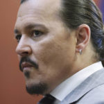 
              Actor Johnny Depp arrives in the courtroom in the Fairfax County Circuit Courthouse in Fairfax, Va., Thursday, May 26, 2022. Actor Johnny Depp sued his ex-wife Amber Heard for libel in Fairfax County Circuit Court after she wrote an op-ed piece in The Washington Post in 2018 referring to herself as a "public figure representing domestic abuse." (Michael Reynolds/Pool Photo via AP)
            