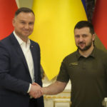 
              Ukrainian President Volodymyr Zelenskyy, right, and Polish President Andrzej Duda shake hands during a news conference after their meeting in Kyiv, Ukraine, Sunday, May 22, 2022. (AP Photo/Efrem Lukatsky)
            
