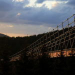 
              View of a suspension bridge for the pedestrians that is the longest such construction in the world a day before its official opening at a mountain resort in Dolni Morava, Czech Republic, Thursday, May 12, 2022. The 721-meter (2,365 feet) long bridge is built at the altitude of more than 1,100 meters above the sea level. It connects two ridges of the mountains up to 95 meters above a valley between them. (AP Photo/Petr David Josek)
            