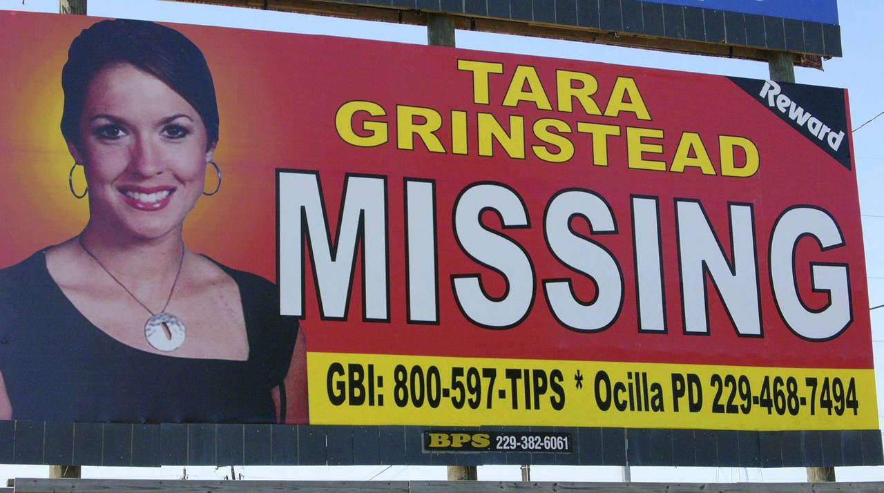 FILE - An image of Tara Grinstead is displayed on a billboard in Ocilla, Ga. Ryan Duke, charged wit...
