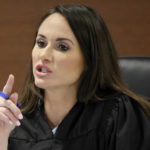 
              Judge Elizabeth Scherer speaks during jury selection in the penalty phase of the trial of Marjory Stoneman Douglas High School shooter Nikolas Cruz at the Broward County Courthouse in Fort Lauderdale on Monday, May 23, 2022. Cruz previously plead guilty to all 17 counts of premeditated murder and 17 counts of attempted murder in the 2018 shootings. (Amy Beth Bennett/South Florida Sun Sentinel via AP, Pool)
            