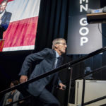 
              Minnesota GOP gubernatorial candidate Dr. Scott Jensen runs onto the stage to speak at the Minnesota State Republican Convention, Saturday, May 14, 2022, in Rochester, Minn.  Jensen, a skeptic of the government's response to COVID-19, won the Minnesota GOP's endorsement to challenge Democratic Gov. Tim Walz in the November election.  (Glen Stubbe/Star Tribune via AP)
            
