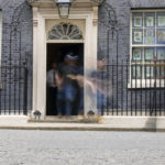 
              People leave and arrive at 10 Downing Street in London, Monday, May 23, 2022. The general public is awaiting the release of Sue Gray's report into COVID lockdown breaches across Whitehall, the so called "Partygate". (AP Photo/Frank Augstein)
            