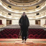 
              Yulia Marukhnenko, who was renting an apartment nearby the Donetsk Academic Regional Drama Theatre in Mariupol, Ukraine, poses for a photo in the Dnipro Academic Drama & Comedy Theatre in Dnipro, Ukraine, on Sunday, March 27, 2022. Following the March 16, 2022, bombing of the theater in Mariupol, Marukhnenko, trained in first aid, with a full kit on hand, was facing problems no first aid could begin to help: limbs, bodies with no limbs, bones sticking out. (AP Photo/Evgeniy Maloletka)
            