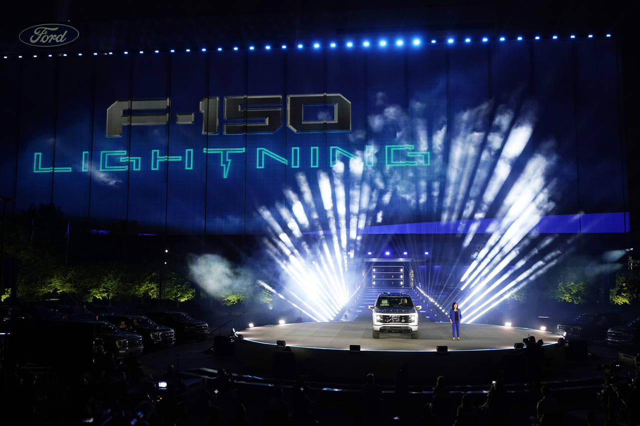 FILE - Ford's Chief Executive Engineer Linda Zhang unveils the Ford F-150 Lightning, Wednesday, May...