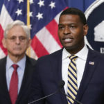 
              Environmental Protection Agency administrator Michael Regan speaks alongside Attorney General Merrick Garland at a news conference to announce actions to enhance the Biden administration's environmental justice efforts, Thursday, May 5, 2022, at the Department of Justice in Washington. (AP Photo/Patrick Semansky)
            