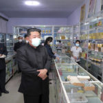 
              FILE - In this photo provided by the North Korean government, North Korean leader Kim Jong Un, center, visits a pharmacy in Pyongyang, North Korea on May 15, 2022. Independent journalists were not given access to cover the event depicted in this image distributed by the North Korean government. The content of this image is as provided and cannot be independently verified. Korean language watermark on image as provided by source reads: "KCNA" which is the abbreviation for Korean Central News Agency. (Korean Central News Agency/Korea News Service via AP, File)
            