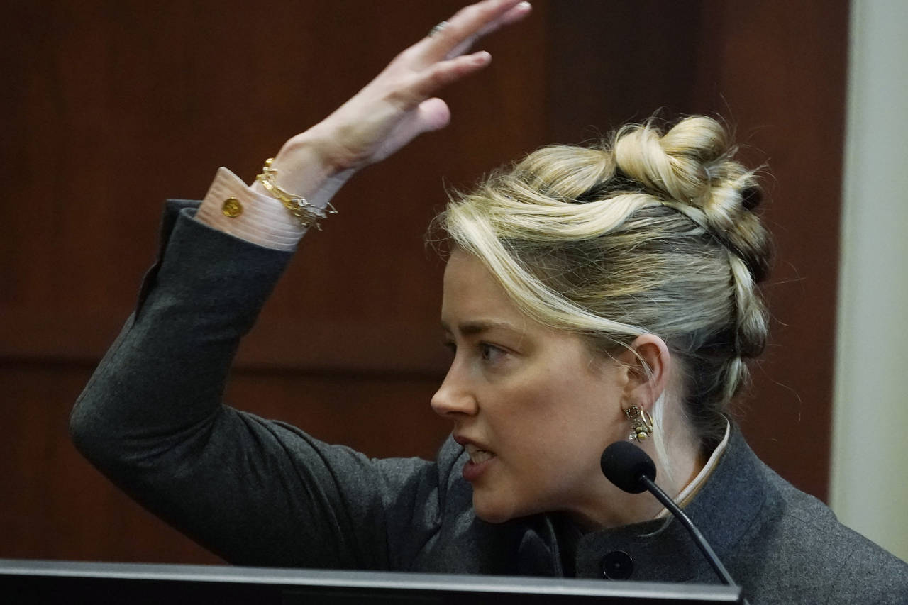 Actor Amber Heard testifies in the courtroom at the Fairfax County Circuit Courthouse in Fairfax, V...