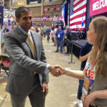 
              Republican gubernatorial candidate Dr. Neil Shah works the delegates to the Minnesota GOP State Convention on Saturday, May 14, 2022, at the Mayo Civic Center in Rochester, Minn.  (AP Photo/Steve Karnowski)
            