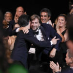 
              Writer/director Ruben Ostlund is congratulated after winning the Palme d'Or for 'Triangle of Sadness' during the awards ceremony of the 75th international film festival, Cannes, southern France, Saturday, May 28, 2022. (Photo by Joel C Ryan/Invision/AP)
            