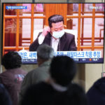 
              People watch a TV screen showing a file image of North Korean leader Kim Jong Un during a news program at a train station in Seoul, South Korea, Saturday, May 14, 2022. North Korea on Saturday reported 21 new deaths and 174,440 more people with fever symptoms as the country scrambles to slow the spread of COVID-19 across its unvaccinated population. (AP Photo/Ahn Young-joon)
            