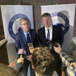 
              Endorsed Minnesota GOP gubernatorial candidate Dr. Scott Jensen, left, and his running mate, former Minnesota Viking and former Baltimore Raven Matt Birk, speak with reporters after Jensen won the party's backing, Saturday, May 14, 2022, at the Minnesota GOP State Convention in Rochester, Minn. (AP Photo/Steve Karnowski)
            