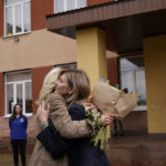 
              First lady Jill Biden hugs Olena Zelenskyy, spouse of Ukrainian's President Volodymyr Zelenskyy, outside of School 6, a public school that has taken in displaced students in Uzhhorod, Ukraine, Sunday, May 8, 2022. (AP Photo/Susan Walsh, Pool)
            