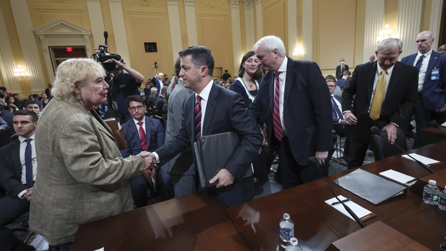 U.S. Rep. Zoe Lofgren (D-CA) shakes hands with Steven Engel, former Assistant Attorney General for ...