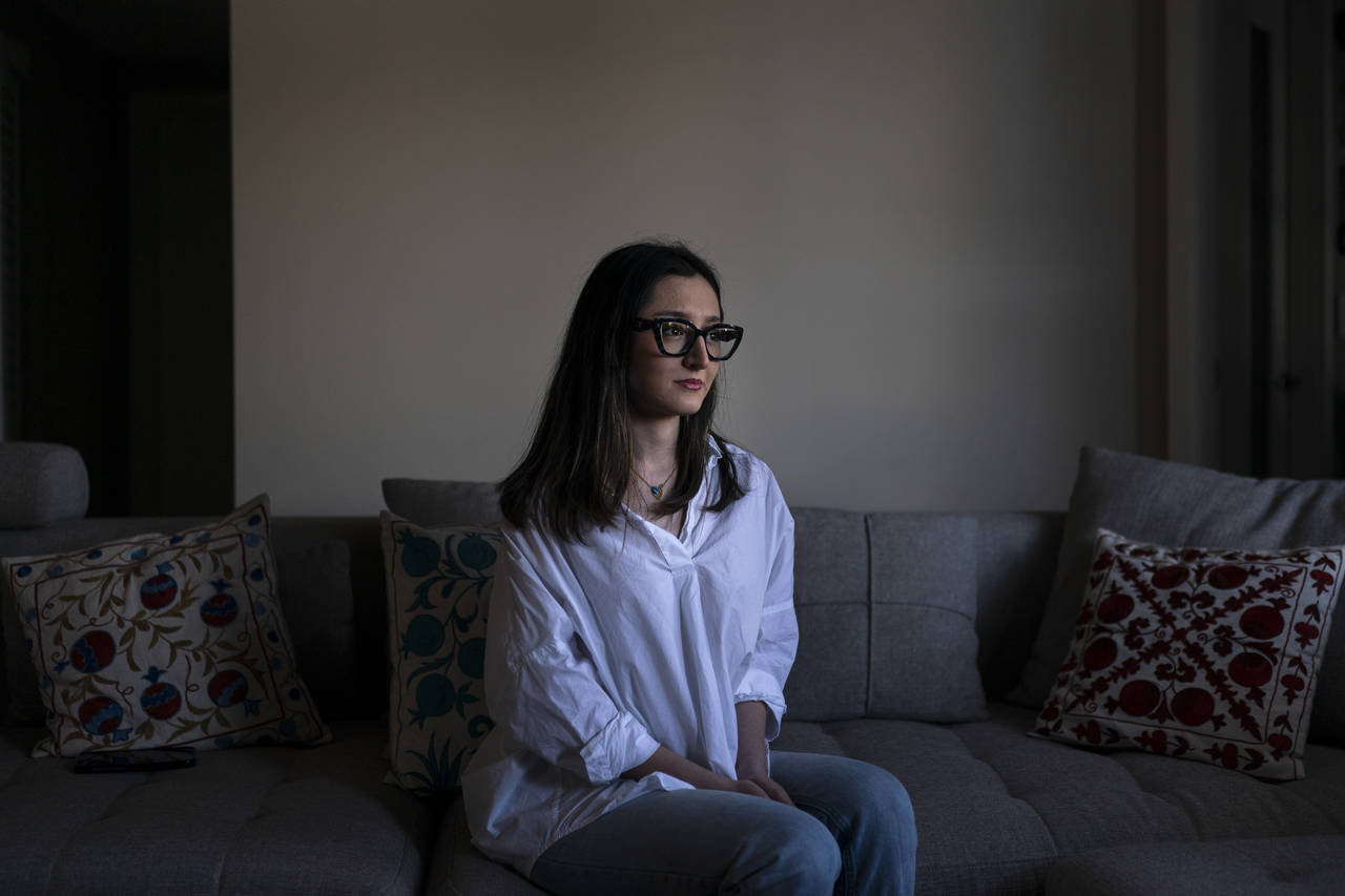 Leili Ghazi, a 22-year-old immigrant from Iran, sits for a photo in Pasadena, Calif., Tuesday, June...