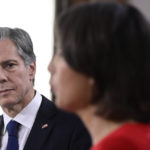 
              US Secretary of State Antony Blinken, left, and German Foreign Minister Annalena Baerbock, right, address the media during a joint press conference after a meeting in Berlin, Germany, Friday, June 24, 2022. (John MacDougall/Pool Photo via AP)
            