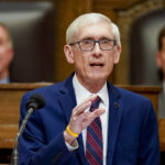 
              FILE - Wisconsin Gov. Tony Evers addresses a joint session of the Legislature in the Assembly chambers at the state Capitol in Madison, Wis. on Feb. 15, 2022. Wisconsin Democrats gathering for their annual state convention this weekend are focused on reelecting Gov. Evers and defeating Republican Sen. Ron Johnson, but also know that history is against them in the midterm year as voters face high inflation, rising gas prices and growing concerns about a recession. Evers and Democratic candidates seeking to take on Johnson are slated to speak at the convention. (AP Photo/Andy Manis, File)
            