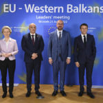 
              From left, European Commission President Ursula von der Leyen, North Macedonia's Prime Minister Dimitar Kovacevski, European Council President Charles Michel and French President Emmanuel Macron pose for a group photo during an EU summit in Brussels, Thursday, June 23, 2022. European Union leaders are expected to approve Thursday a proposal to grant Ukraine a EU candidate status, a first step on the long toward membership. The stalled enlargement process to include Western Balkans countries in the bloc is also on their agenda at the summit in Brussels. (John Thys, Pool Photo via AP)
            