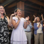 
              Supporters of Nebraska Democratic congressional nominee Patty Pansing Brooks, including from left, Katie Taddeucci and Aaliyah Dawson, cheer as she speaks, Tuesday, June 28, 2022, in Lincoln, Neb. (Justin Wan/Lincoln Journal Star via AP)
            