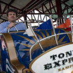 
              Alessandro Zamperla, president & CEO of Central Amusement International, sits in one of his new rides named after his grandfather Antonio at his company's construction site in the amusement park district of Coney Island, Friday, June 17, 2022, in the Brooklyn borough of New York. Luna Park in Coney Island will open three new major attractions this season alongside new recreational areas and pedestrian plazas. (AP Photo/John Minchillo)
            