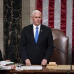 
              FILE - Vice President Mike Pence, returns to the House chamber after midnight, Jan. 7, 2021, to finish the work of the Electoral College after a mob loyal to President Donald Trump stormed the Capitol in Washington and disrupted the process. (AP Photo/J. Scott Applewhite, File)
            