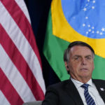 
              Brazilian President Jair Bolsonaro speaks at a meeting with President Joe Biden during the Summit of the Americas, Thursday, June 9, 2022, in Los Angeles. (AP Photo/Evan Vucci)
            