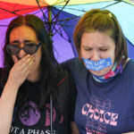 
              Abortion-rights activists react after hearing the Supreme Court decision on abortion outside the Supreme Court in Washington, Friday, June 24, 2022. The Supreme Court has ended constitutional protections for abortion that had been in place nearly 50 years in a decision by its conservative majority to overturn Roe v. Wade. (AP Photo/Jacquelyn Martin)
            