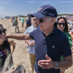 
              President Joe Biden introduces his granddaughter Natalie Biden, left, to the members of the media as they walk on the beach together with daughter Ashley Biden, right, in Rehoboth Beach, Del., Monday, June 20, 2022. (AP Photo/Manuel Balce Ceneta)
            