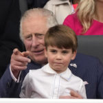 
              Prince Charles and Prince Louis attend the Platinum Jubilee Pageant outside Buckingham Palace in London, Sunday, June 5, 2022, on the last of four days of celebrations to mark the Platinum Jubilee. (AP Photo/Frank Augstein, Pool)
            