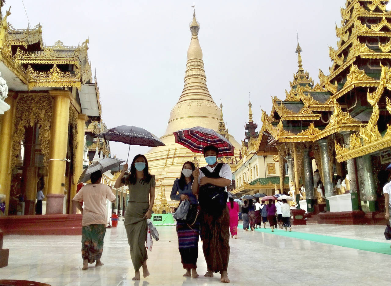 Pilgrims visit Myanmar famous Shwedagon Pagoda in Yangon, Myanmar on Sunday, June 19, 2022.  Severa...