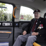 
              British veteran Bill Gladen arrives in a British Taxi Charity for Military Veterans to the ceremony at Pegasus Bridge, in Ranville, Normandy, Sunday, June, 5, 2022. On Monday, the Normandy American Cemetery and Memorial, home to the gravesites of 9,386 who died fighting on D-Day and in the operations that followed, will host U.S. veterans and thousands of visitors in its first major public ceremony since 2019. (AP Photo/Jeremias Gonzalez)
            