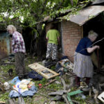 
              Residents recover belongings from their damaged home after a strike in Druzhkivka, Ukraine, Sunday, June 5, 2022. (AP Photo/Bernat Armangue)
            