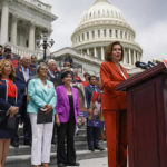 
              House Speaker Nancy Pelosi of Calif., and other lawmakers, speaks about the gun violence bill at the Capitol in Washington, Friday, June 24, 2022. (AP Photo/J. Scott Applewhite)
            
