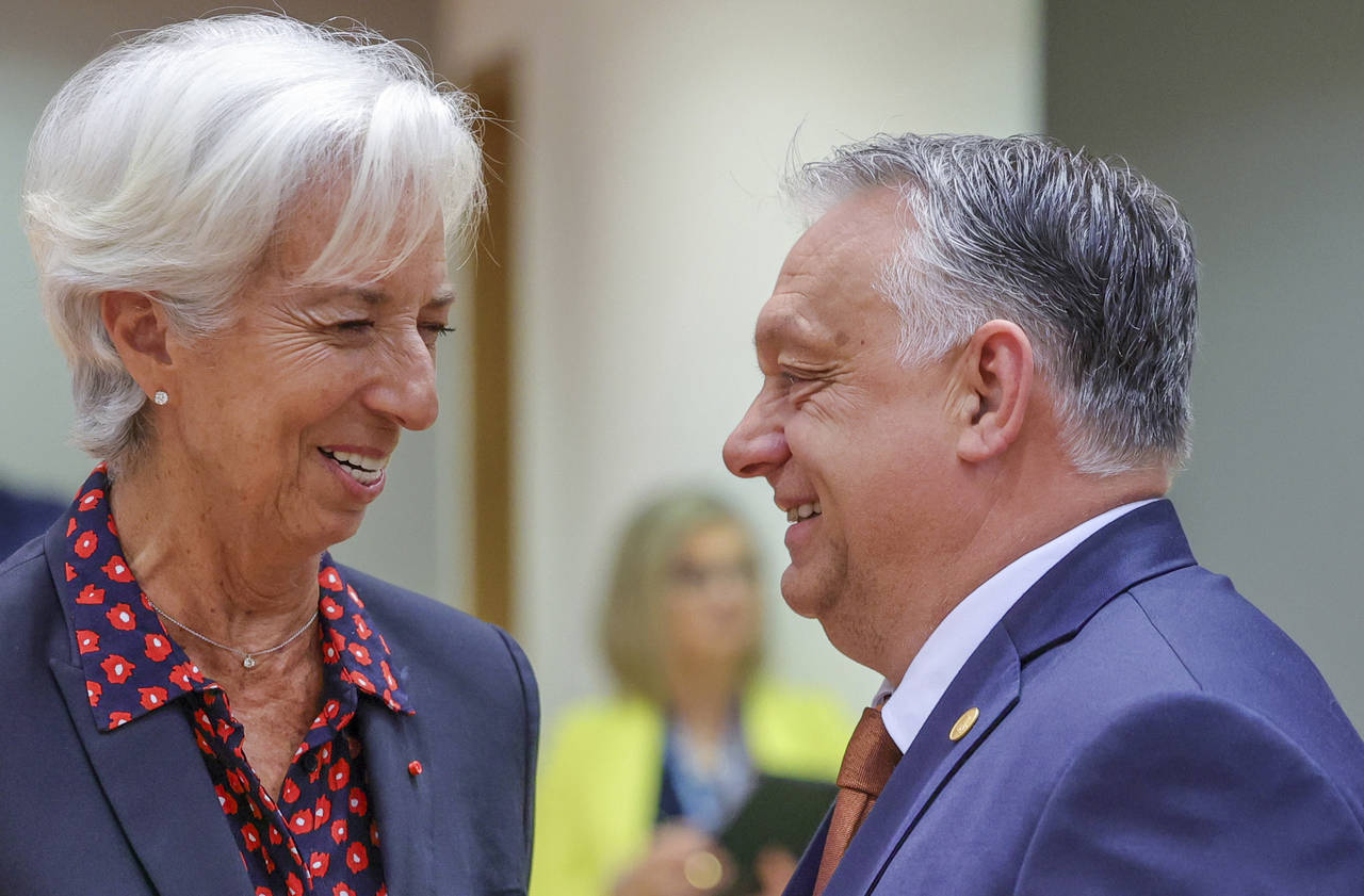 European Central Bank President Christine Lagarde, left, speaks with Hungary's Prime Minister Vikto...