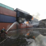 
              A firefighter tries to douse the fire at the BM Inland Container Depot, where a fire broke out around midnight Saturday in Chittagong, about 210 kilometers (130 miles) southeast of, Dhaka, Bangladesh, Monday, June 6, 2022. Dozens of people were killed and more than 100 others were injured after the inferno broke out following explosions in a container full of chemicals. (AP Photo)
            