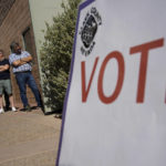 
              People wait in line to vote at a polling place Tuesday, June 14, 2022, in Las Vegas. (AP Photo/John Locher)
            