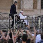 
              FILE-- Pope Francis greets the faithful as he leaves St. Mary Major Basilica after participating in a rosary prayer for peace, in Rome, Tuesday, May 31, 2022. Pope Francis canceled a planned July trip to Africa on doctors' orders because of ongoing knee problems, the Vatican said Friday, June 10, 2022, raising further questions about the health and mobility problems of the 85-year-old pontiff.  (AP Photo/Gregorio Borgia)
            