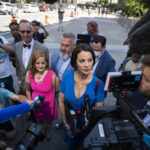 
              Sarah Ransome, an alleged victim of Jeffrey Epstein and Ghislaine Maxwell, right, alongside Elizabeth Stein, left, speak to members of the media outside federal court, Tuesday, June 28, 2022, in New York. Ghislaine Maxwell, the jet-setting socialite who once consorted with royals, presidents and billionaires, was set to be sentenced Tuesday for helping the wealthy financier Jeffrey Epstein sexually abuse underage girls. (AP Photo/John Minchillo)
            
