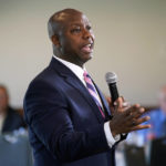 
              Sen. Tim Scott, R-S.C., speaks during an Iowa GOP reception, Thursday, June 9, 2022, in Cedar Rapids, Iowa. At least a half dozen GOP presidential prospects are planning Iowa visits this summer, forays that are advertised as promoting candidates and the state Republican organization ahead of the fall midterm elections. But in reality, the trips are about building relationships and learning the political geography in the state scheduled to launch the campaign for the party's 2024 nomination. (AP Photo/Charlie Neibergall)
            
