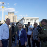 
              European Commission President Ursula von der Leyen, center, visits Maidan square in Kyiv, Ukraine, Saturday, June 11, 2022. (AP Photo/Natacha Pisarenko)
            