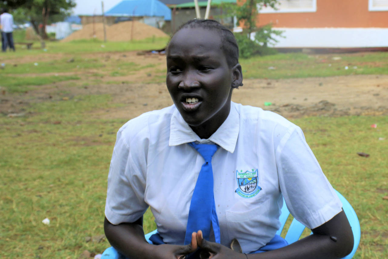 Nyanachiek Madit, 21, who successfully refused when her father told her at age 17 that she would be...