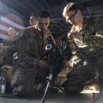 
              FILE - Members of the 82nd Airborne Division of the U.S. Army clean weaponry ahead of deployment to Poland from Fort Bragg, N.C. on Monday, Feb. 14, 2022. Seven decades after it was founded, the North Atlantic Treaty Organization is meeting in Madrid on June 29 and 30, 2022 with an urgent need to reassert its original mission: preventing Russian aggression against Western allies. (AP Photo/Nathan Posner, File)
            